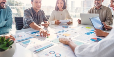People reviewing online advertising proposals